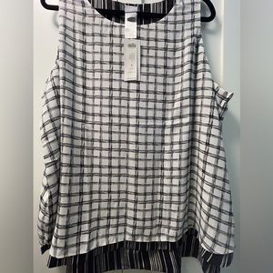 NWT Chico’s sleeveless blouse. Black and white, reversible. Size 4